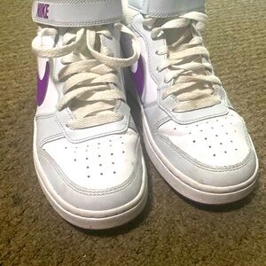Used Nike purple and white size6y(size 6in youth)